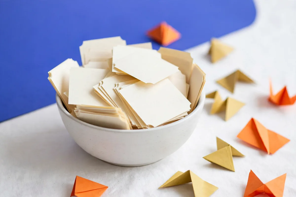Paper tickets in a bowl