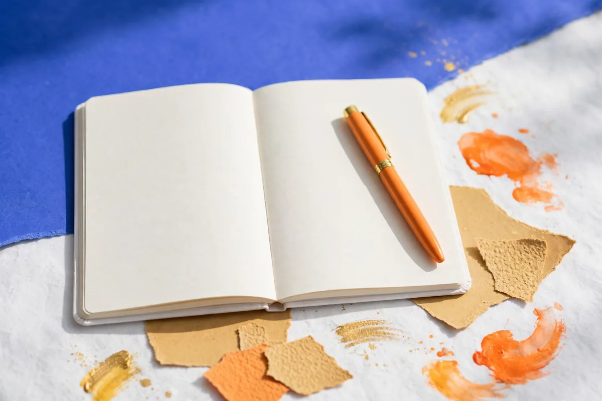 A notebook and pen