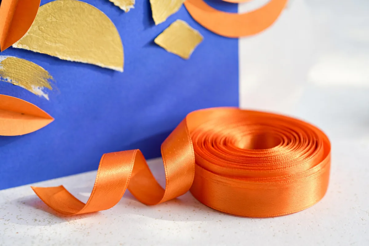 A coil of orange ribbon